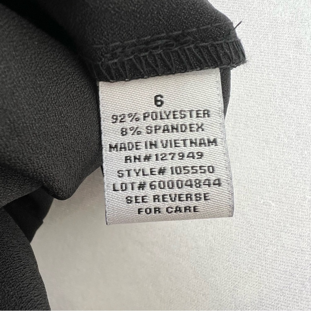 NWT Emma & Michele black wrap sleeveless belted romper. - Picture 10 of 11